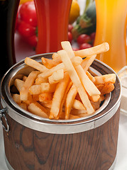 Image showing fresh french fries on a bucket