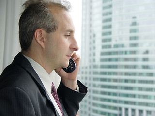 Image showing Businessman by the window