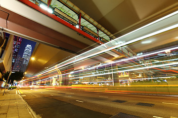 Image showing car light trails in modern city