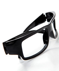 Image showing black glasses on a white background 