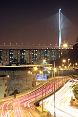 Image showing traffic through downtown at night 