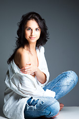 Image showing sexy young woman on wearing blue jeans