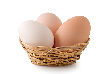 Image showing Eggs lay in a woven basket
