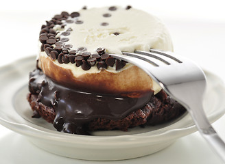 Image showing fudge brownie with ice cream