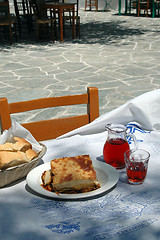 Image showing greek taverna meal with wine