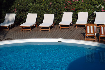 Image showing pool with lounge chairs