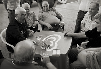 Image showing Men playing cards