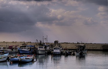 Image showing Fishing ships in a harbor