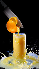 Image showing juice and knife