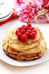 Image showing Pancakes with fresh raspberries