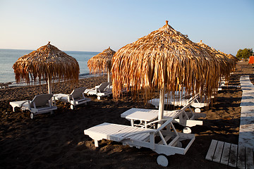 Image showing Sunbeds in Perissa, Santorini, Greece