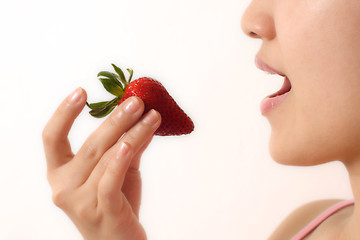 Image showing Woman and strawberry