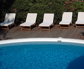 Image showing pool with lounge chairs