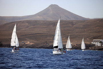 Image showing LANZAROTE, SPAIN - OCTOBER 11: three fully crewed yachts out sai