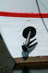 Image showing Black anchor on a white boat