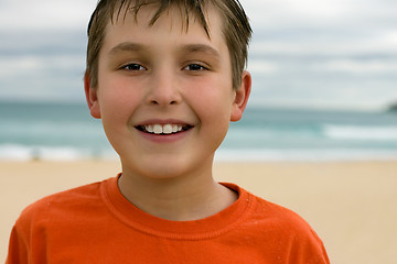 Image showing Smiling child beach background