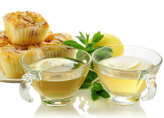 Image showing green tea and cupcakes