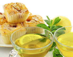 Image showing green tea and cupcakes