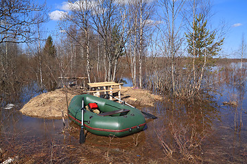 Image showing green rubber boat near coast