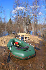 Image showing green rubber boat near coast