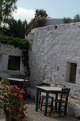 Image showing restaurant next to ancient building