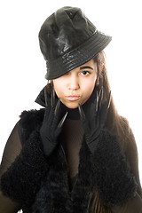 Image showing Portrait of attractive young brunette in gloves with claws