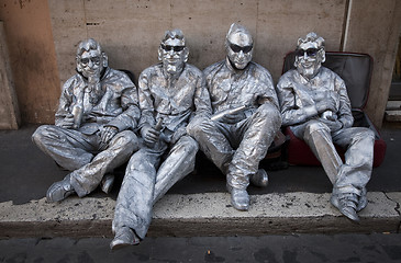 Image showing Four cool silver blokes