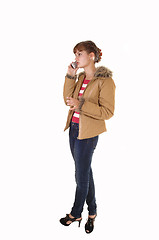 Image showing Girl with brown jacket.