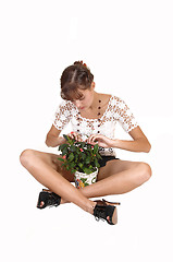 Image showing Girl with plant.