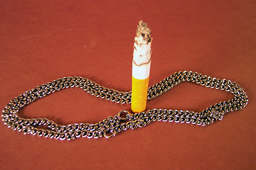 Image showing chain lip smoking