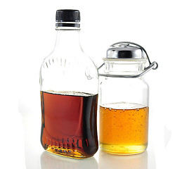 Image showing maple syrup and honey 