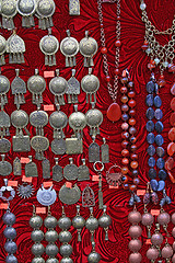 Image showing homemade valuables on red background