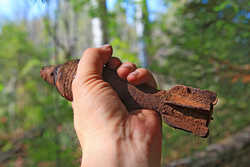 Image showing grenade launcher mine in hand