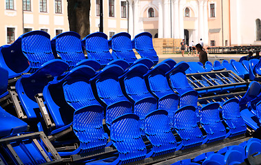 Image showing blue easy chairs on stadium
