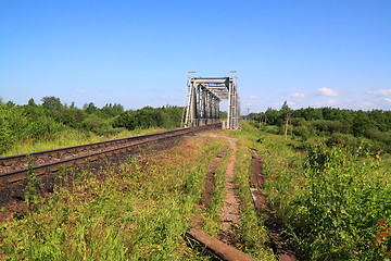 Image showing old railway bridge through small river 