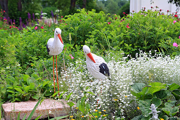 Image showing toy crane on town lawn