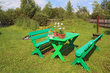 Image showing garden furniture in summer garden