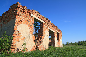 Image showing destroyed brick wall amongst 