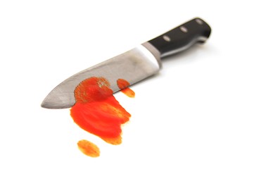 Image showing knife with red blood from murder