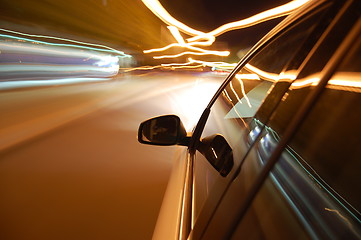 Image showing night drive with car in motion 