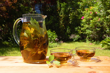 Image showing cup of tea in the garden