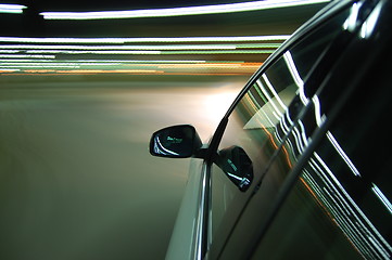 Image showing night drive with car in motion 