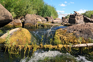 Image showing greater stone on mountain river