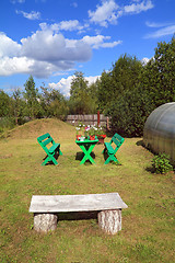 Image showing wooden furniture in summer garden