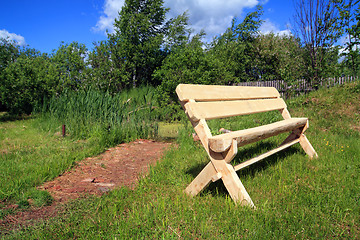 Image showing wooden bench in summer park
