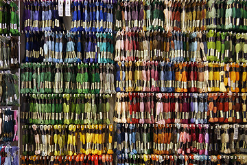 Image showing A selection of embroidery yarn in all colors