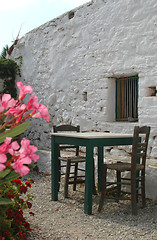 Image showing restaurant next to ancient building