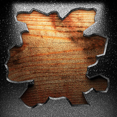 Image showing iron plate on wood