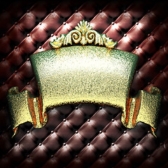 Image showing golden ornament on leather