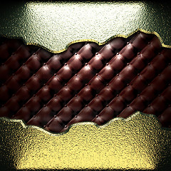 Image showing golden plate on leather